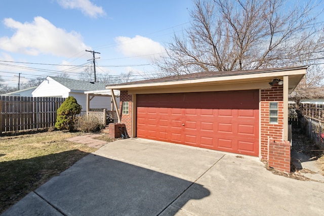 detached garage with fence