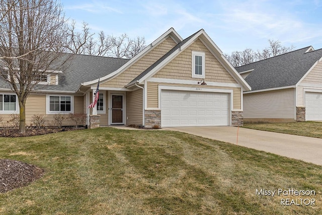 craftsman house featuring a garage, stone siding, concrete driveway, and a front lawn