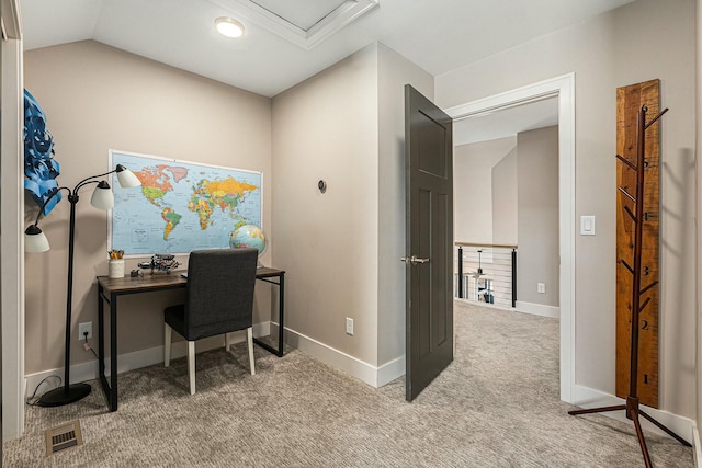 office space with light carpet, visible vents, baseboards, and vaulted ceiling