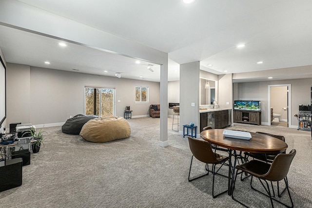 dining area with light carpet, recessed lighting, and baseboards