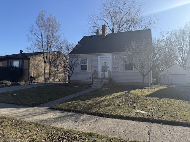 view of front of house with an outdoor structure