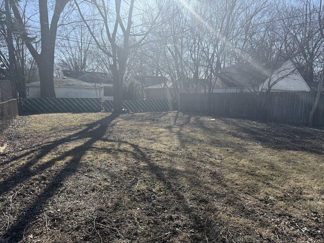 view of yard featuring a fenced backyard