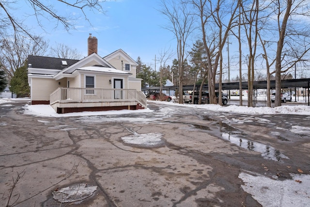 exterior space featuring a chimney