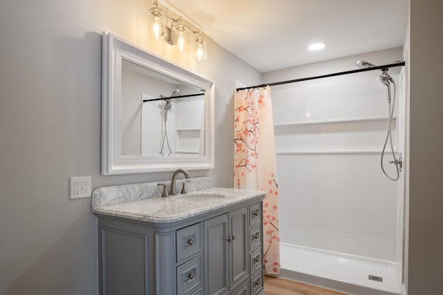bathroom featuring vanity and a shower with curtain