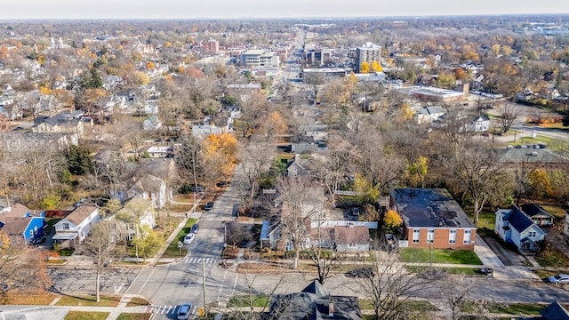 birds eye view of property with a residential view