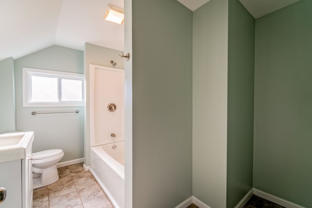 full bath featuring baseboards, toilet, vaulted ceiling, a bathing tub, and vanity