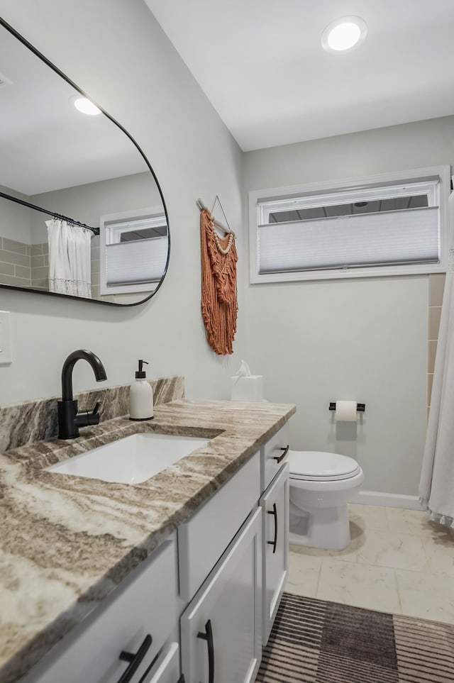 full bathroom featuring visible vents, baseboards, toilet, marble finish floor, and vanity