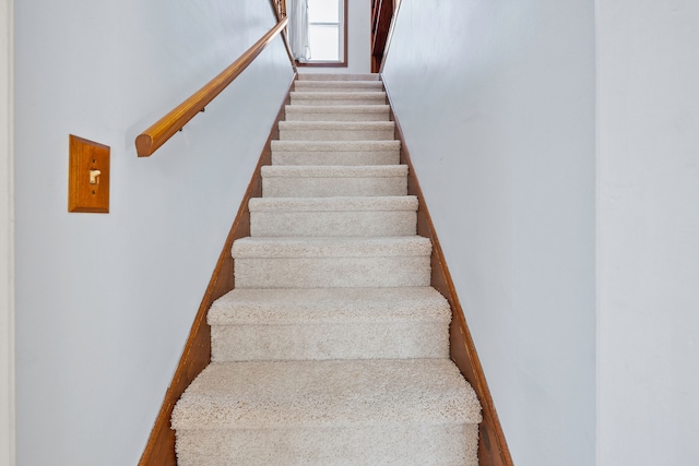 stairway with baseboards