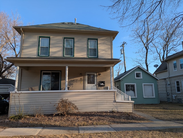 traditional style home featuring a porch