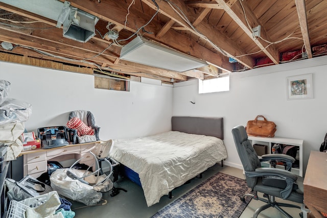 bedroom with finished concrete flooring