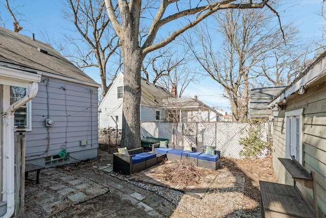 view of yard featuring a patio and fence