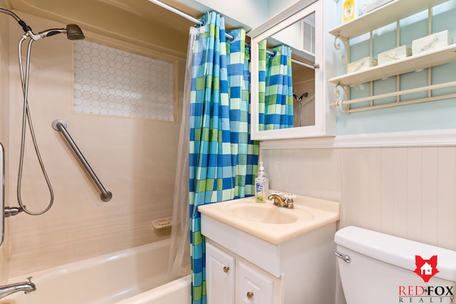 bathroom with visible vents, a wainscoted wall, toilet, vanity, and shower / bathtub combination with curtain