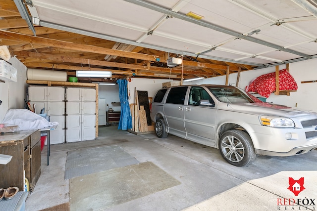 garage featuring a garage door opener