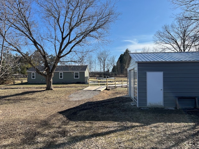 view of yard with an outdoor structure