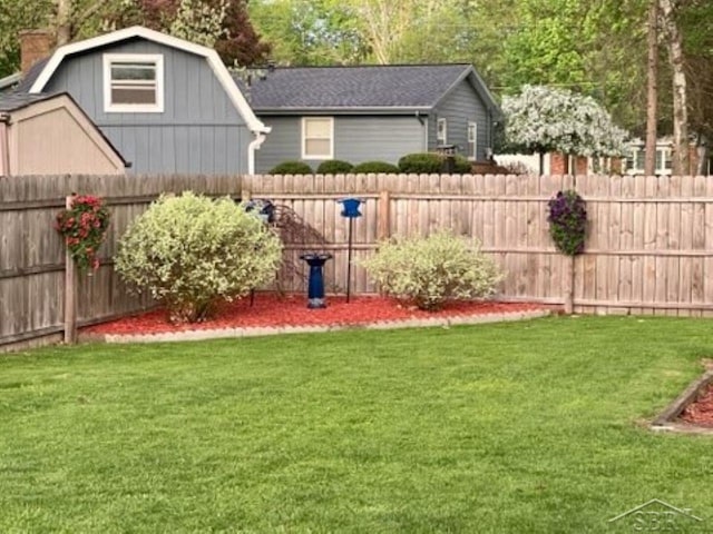 view of yard featuring a fenced backyard