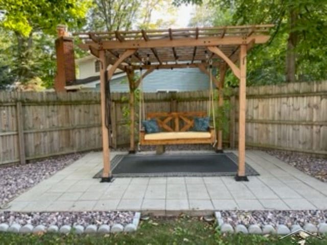 view of patio / terrace featuring a pergola and a fenced backyard