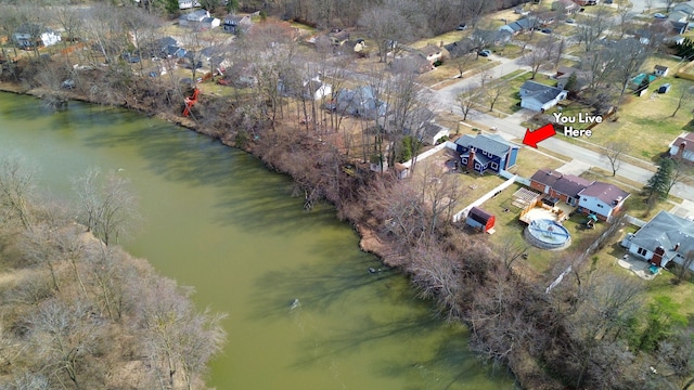 aerial view featuring a residential view and a water view