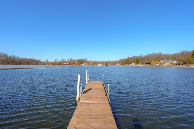 view of dock with a water view