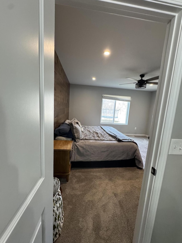 carpeted bedroom featuring recessed lighting and a ceiling fan