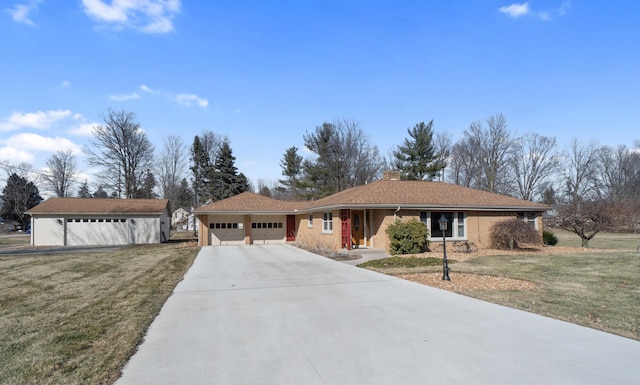 single story home with a front yard, concrete driveway, a garage, and a chimney