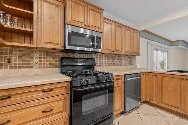 kitchen with tasteful backsplash, crown molding, light countertops, appliances with stainless steel finishes, and light tile patterned flooring