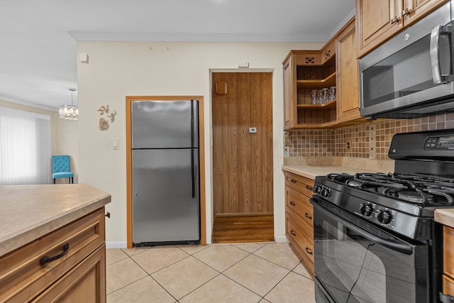 kitchen featuring tasteful backsplash, appliances with stainless steel finishes, light tile patterned flooring, brown cabinetry, and light countertops