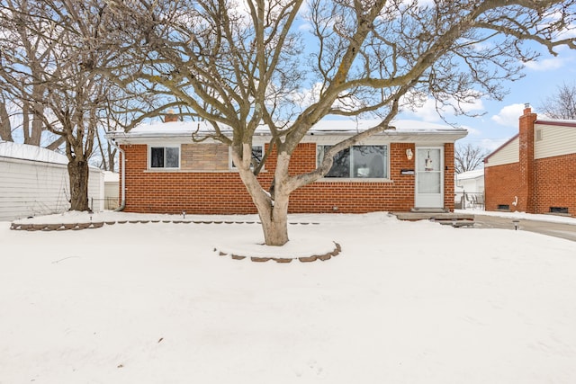 view of front of home with brick siding