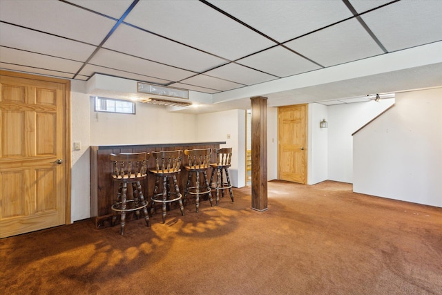 bar featuring a drop ceiling, carpet, and a dry bar