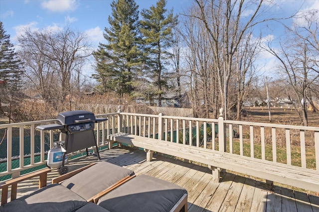 wooden deck featuring grilling area