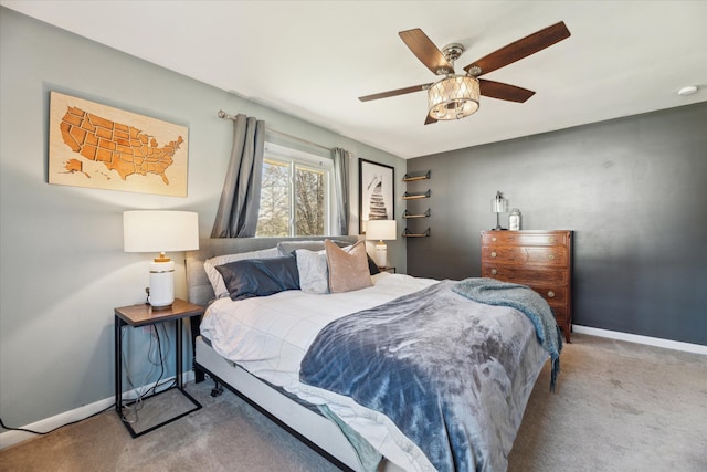 bedroom featuring a ceiling fan, baseboards, and carpet floors