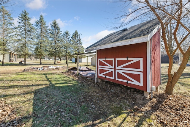 view of outbuilding with an outbuilding