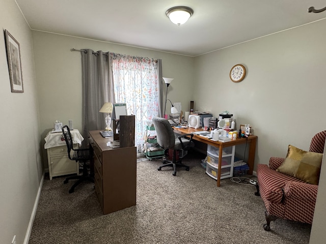 carpeted office with baseboards