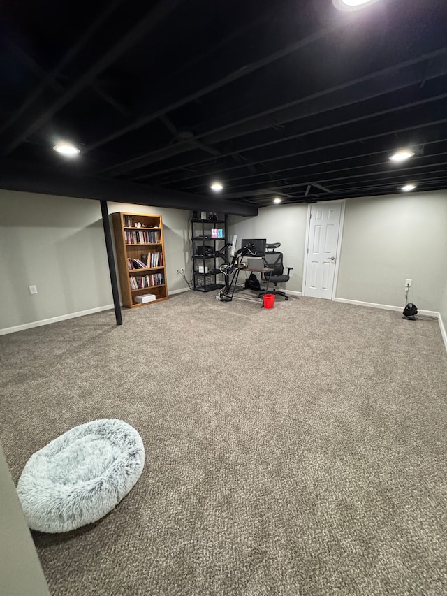 finished basement featuring carpet and baseboards