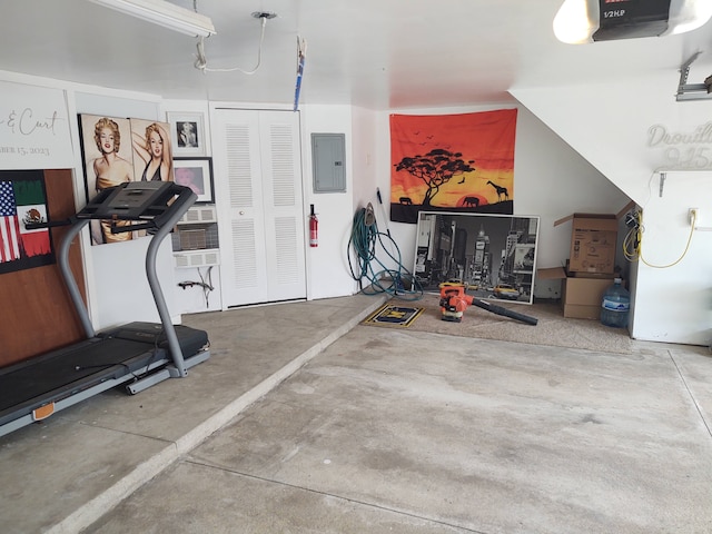 interior space featuring electric panel and a garage