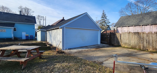 detached garage with fence