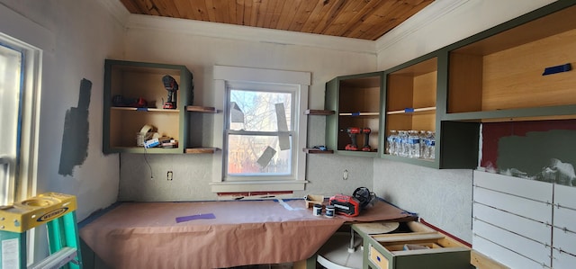 interior space featuring wood ceiling and ornamental molding