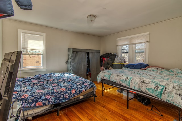 bedroom with wood-type flooring