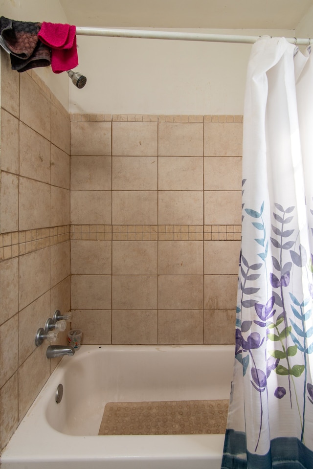 full bathroom with shower / tub combo