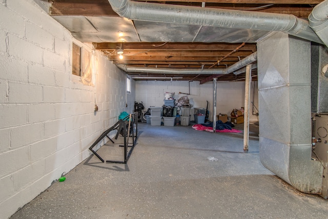 unfinished basement with heating unit