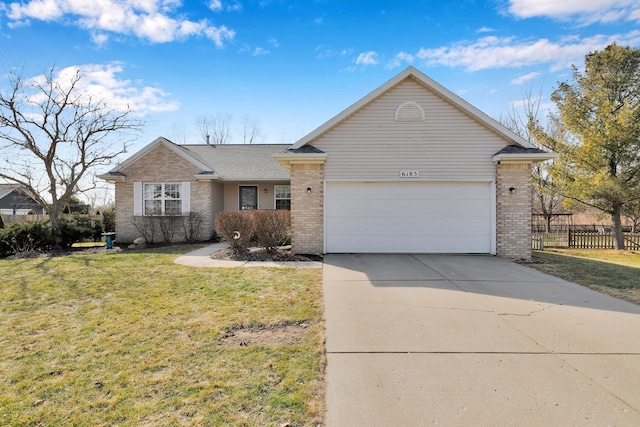 ranch-style home featuring a front yard, fence, concrete driveway, a garage, and brick siding