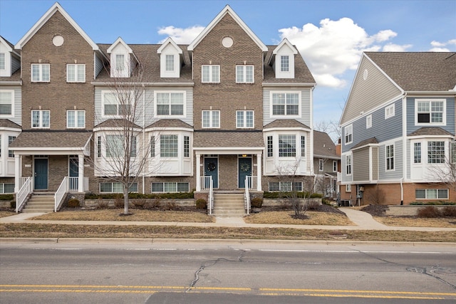 multi unit property featuring brick siding