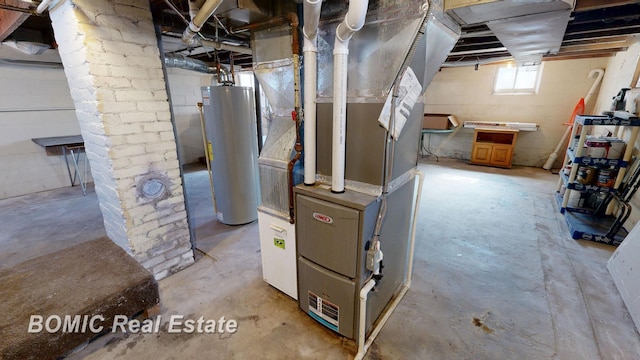 basement featuring heating unit and gas water heater