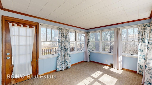 view of unfurnished sunroom