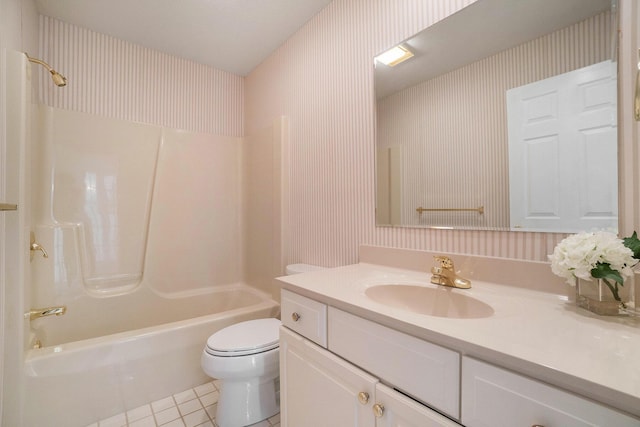 bathroom with toilet, wallpapered walls, tile patterned flooring, bathing tub / shower combination, and vanity