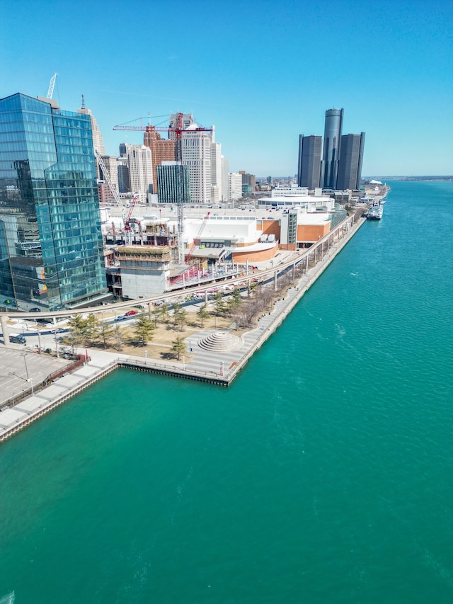 drone / aerial view with a water view and a city view