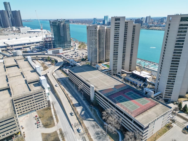 birds eye view of property featuring a view of city and a water view