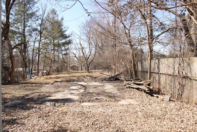 view of yard with fence