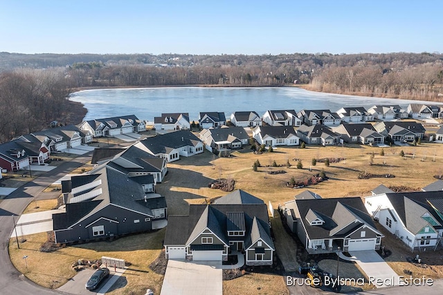 aerial view with a residential view and a water view