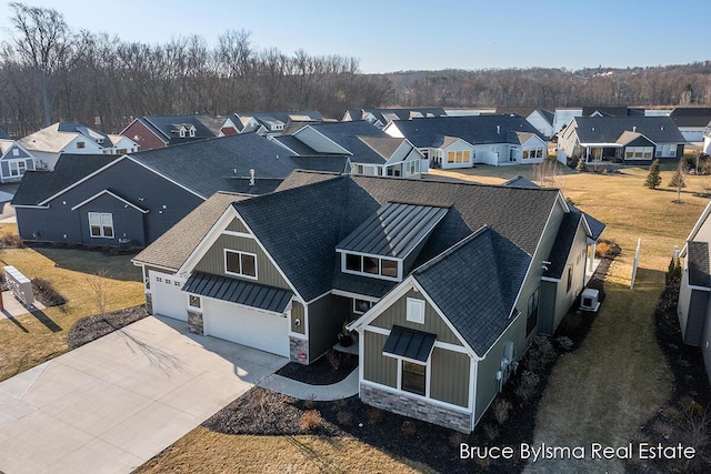 drone / aerial view featuring a residential view