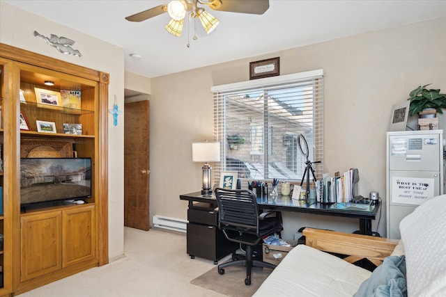 office with a ceiling fan, light colored carpet, and a baseboard radiator